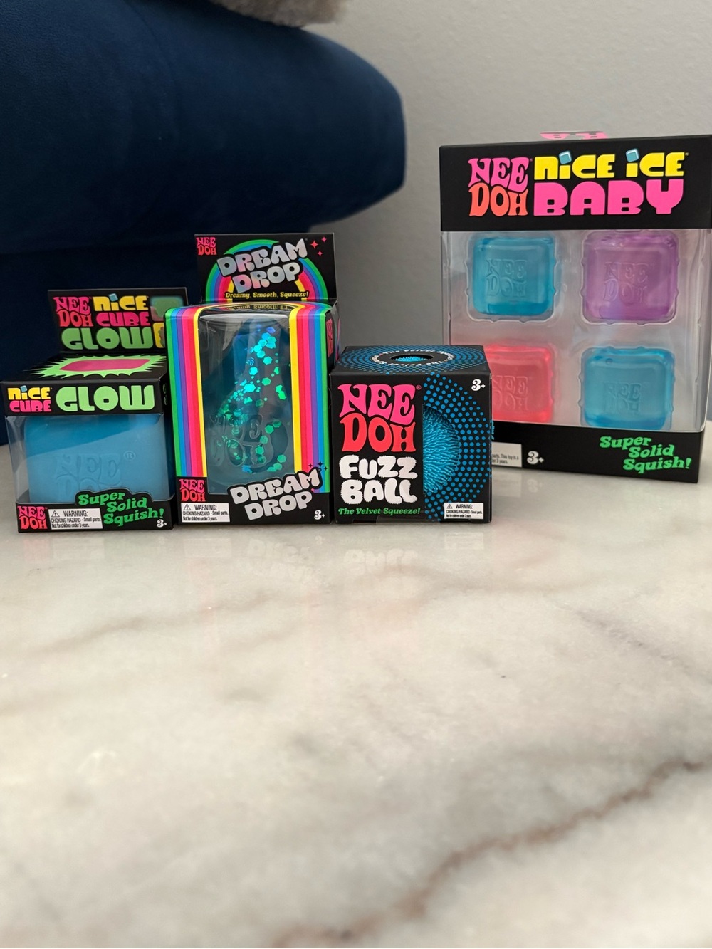 Needoh Nice Cube Glow, Dream Drop, Fuzzball, and Nice Ice Baby set (4 items)
